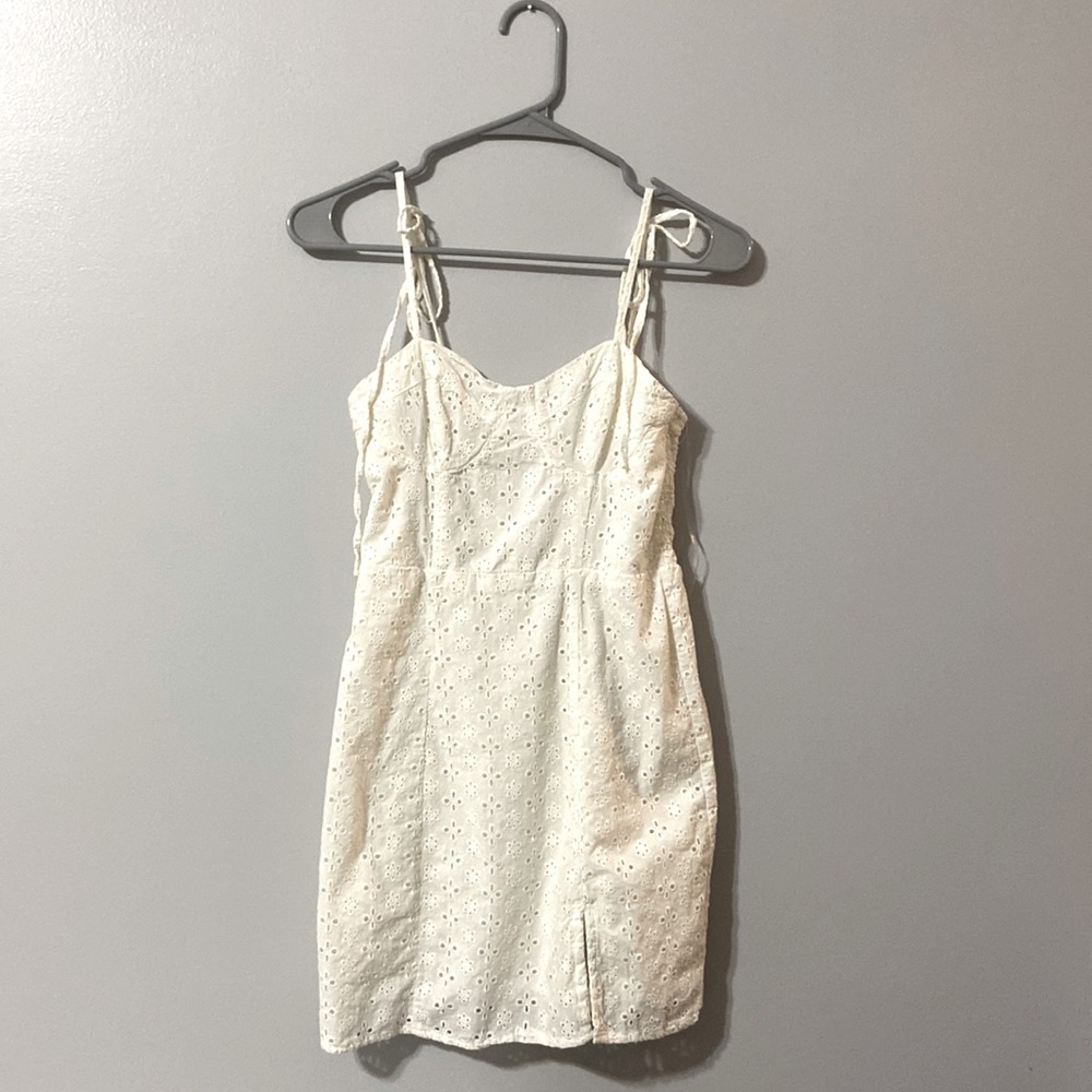 A white XS embroidered dress from Aeropostal. Never worn. neutral and versatile